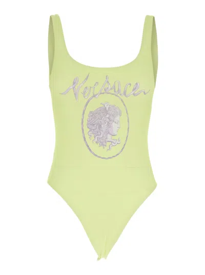 VERSACE YELLOW ONE-PIECE SWIMSUIT WITH MEDUSA PRINT AND LOGO LETTERING ON THE FRONT IN TECH FABRIC WOMAN