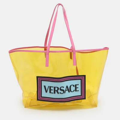 Pre-owned Versace Yellow/pink Clear Pvc Logo Tote