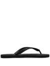 Vetements Logo-embossed Flip Flops In Black