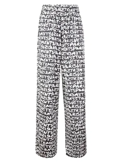 Vetements Printed High-rise Cotton Wide-leg Pants In Grafitti Print Black/white