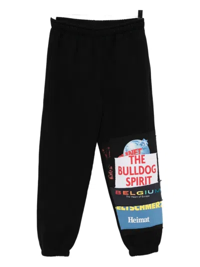 Vetements Graphic-print Trousers In Black