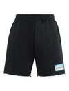 Vetements Logo-print Frayed Track Shorts In Black