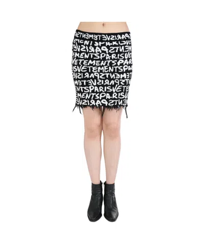 VETEMENTS VETEMENTS PARIS MONOGRAM MINI SKIRT