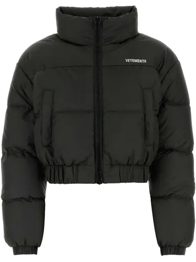 VETEMENTS LOGO DOWN JACKET