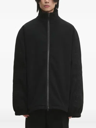 Vetements Logo-embossed Zip-up Jacket In Black