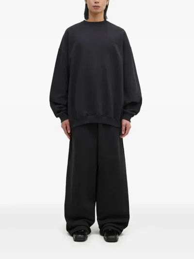 Vetements Logo-embroidered Crew-neck Sweatshirt In Black