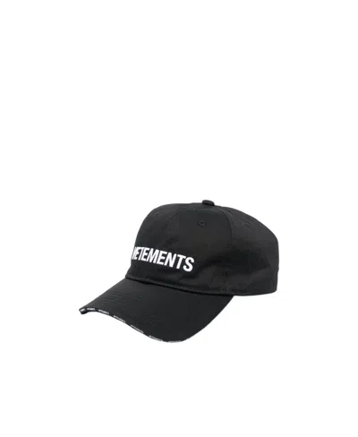 Vetements Logo-embroidered Curved-peak Cap In Black
