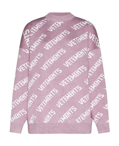 VETEMENTS VETEMENTS ALL-OVER LOGO EMBROIDERED SWEATER