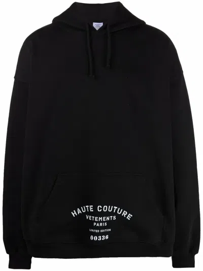 Vetements Logo-print Pocket Hoodie In Black