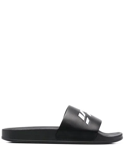 VETEMENTS LOGO-PRINT SLIDES