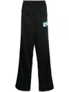 Vetements Logo-print Wide-leg Trousers In Schwarz