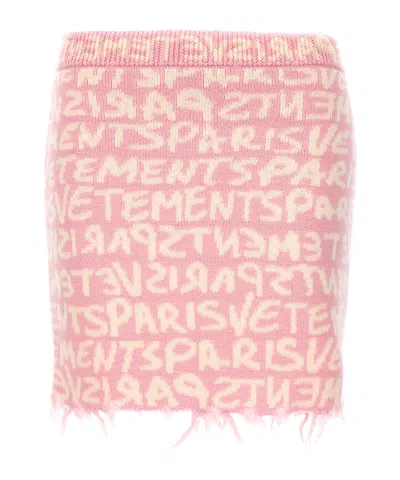 VETEMENTS VETEMENTS GRAFFITI MONOGRAM MINI SKIRT