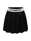 Vetements Black Skirt For Girl With Logo In Black