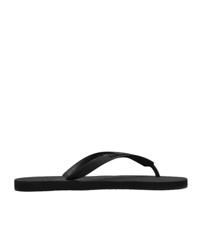 VETEMENTS EMBOSSED LOGO FLIP FLOPS