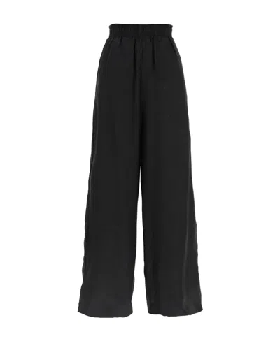 Vetements Satin-finish Wide-leg Trousers In Black
