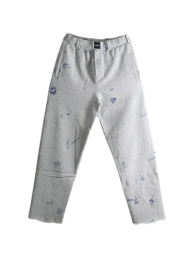 Vetements Scribble-print Raw-edge Track Pants In Multi