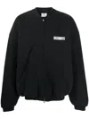 Vetements Slogan-print Cotton Bomber Jacket In Black