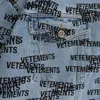 Vetements Stamped Logo Denim Jacket In Blue
