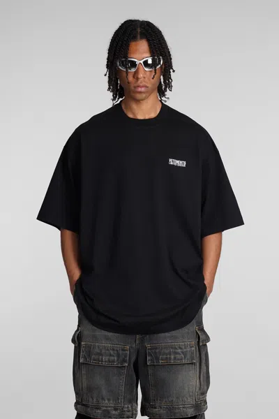 VETEMENTS VETEMENTS T-SHIRT IN BLACK COTTON