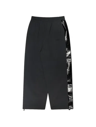Vetements Taped-seam Logo-print Track Pants In Blue