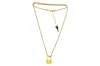 Vickisarge Women's The Mouche Lock Necklace In Gold In Gold