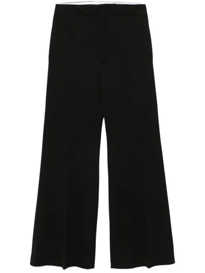 Victoria Beckham Kick Trousers In 黑色