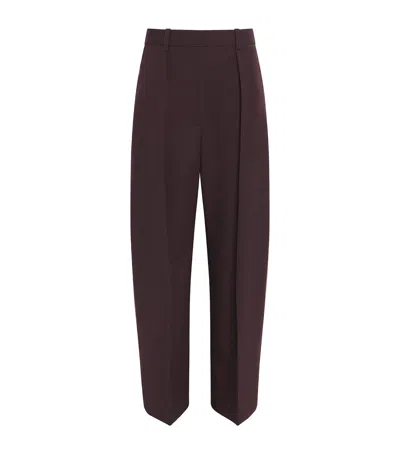 Victoria Beckham Pleated Wide-leg Trousers In Brown