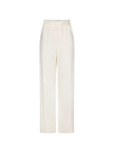 Victoria Beckham Relaxed Curved-leg Trousers In 뉴트럴