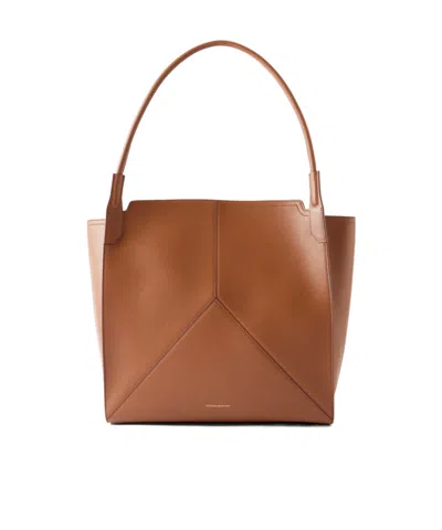 Victoria Beckham Soft Paneled Leather Tote In Brown