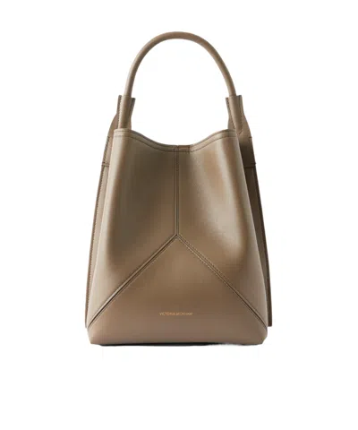 Victoria Beckham The Victoria Bucket Leather Shoulder Bag In Gold