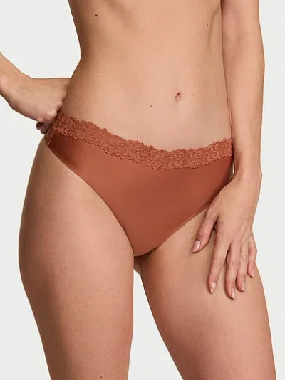 Victoria's Secret Body By Victoria By Flex Lace-trim Mid-rise Thong Panty In Brown