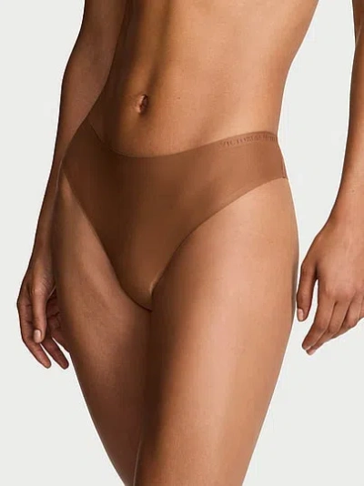 Victoria's Secret Body By Victoria By Flex Mid-rise Thong Panty In Brown