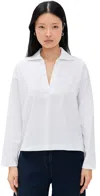 Vince Easy Long Sleeve Cotton Polo In Optic White
