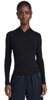 Vince Long Sleeve Fixed Stretch Wrap Top In Black In Black