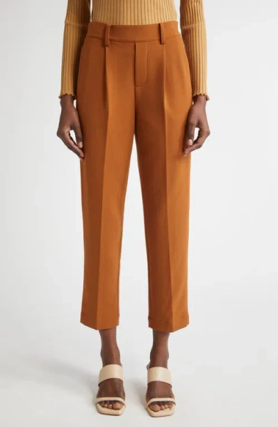 Vince Pleated Pull-on Tapered Leg Pants In Orange
