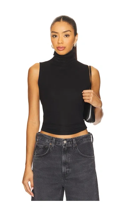 Vince Sleeveless Turtleneck Top In Black