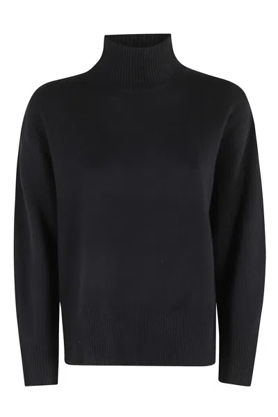 Vince Turtle Neck Side Slit Sweater In Black