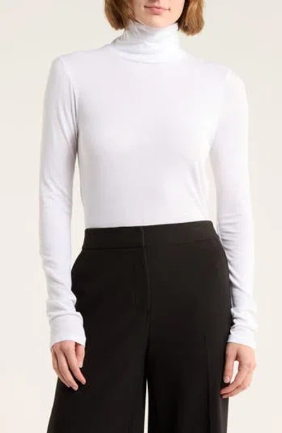 Vince Turtleneck Long Sleeve Top In White