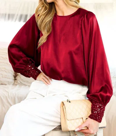 Vine & Love Sequin Cuff Accent Boat Neck Satin Blouse In Burgundy In White