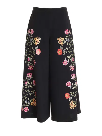 Vivetta Flower Print Pants In Black In Negro