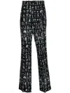 VIVIENNE WESTWOOD ALL OVER GRAPHIC PRINT TROUSERS