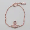 Vivienne Westwood Pink Gold Brass Bracelet In Pink Gold/pink