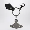 Vivienne Westwood Black Hammered Metal Orb Keychain In Metallic