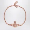 Vivienne Westwood Mini Bas Relief Chain Bracelet In Rose Gold In Gold