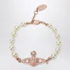 Vivienne Westwood Mini Bas Relief Pearl Bracelet Rose Gold In Gold