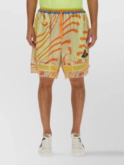 VIVIENNE WESTWOOD PRINTED FRINGE MESH OVERLAY SHORTS
