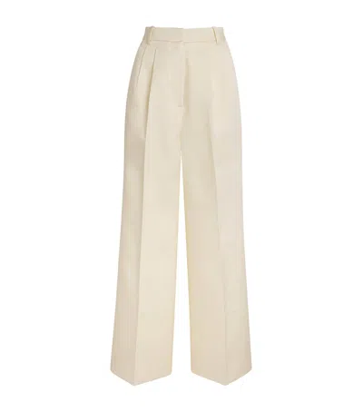Voranida Pleated Wide-leg Trousers In White