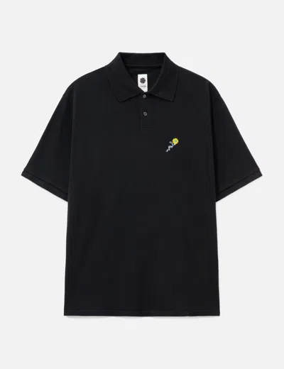 Vowels Short Sleeve Pique Polo In Black