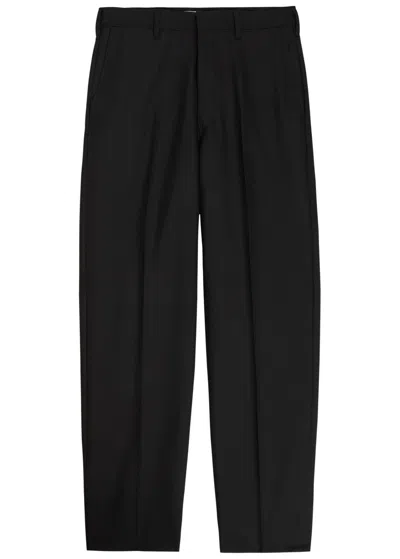 Vowels Tapered-leg Wool-blend Trousers In Black