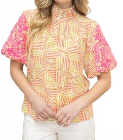 Voy Smocked Neck Contrast Embroidered Bubble Sleeve Top In Vibrant Orange & Yellow Geometric In Multi